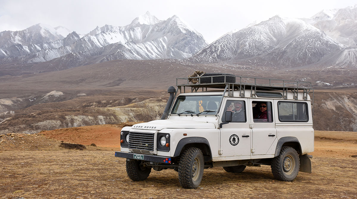 Landrover Overland Tour of Upper Mustang. At Karola Pass from where Tibetan plateau starts.