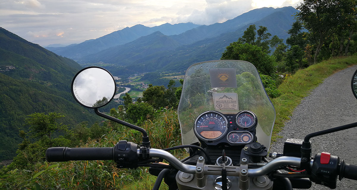 Royal Enfield Himalayan Bike overlooking a beautiful Trishuli valley, Nuwakot.
